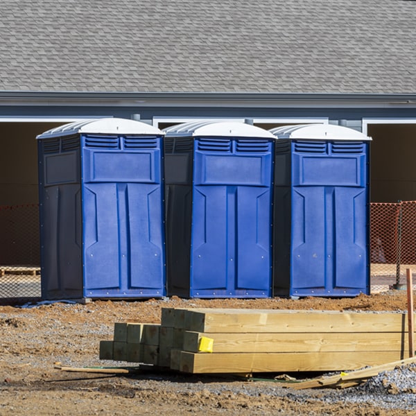 what is the cost difference between standard and deluxe portable toilet rentals in Glenn Heights